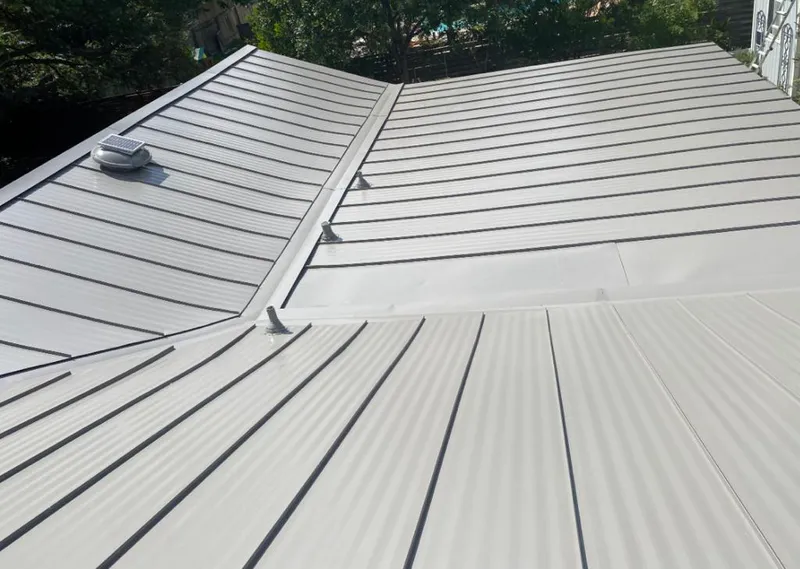 Solar attic fan installed on a metal roof for Roof Ventilation in Mesquite